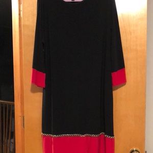 MSK Dress 2X Black with gold chair on bottom with reddish orange in color.